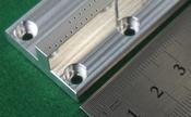 材質A5052（a5052）　Φ0.3㎜の小径穴加工　微細穴加工　産業用ロボットのアルミ精密部品